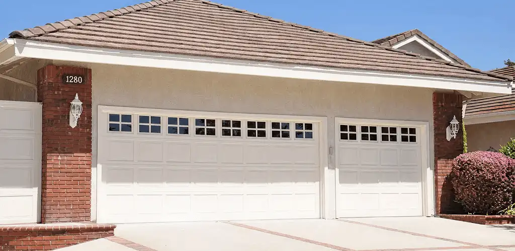 Residential garage door repair service for a double garage door in Chula Vista, CA