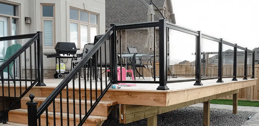 Handrail installation on a deck staircase for safety and code compliance in Chula Vista, CA
